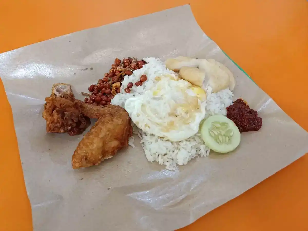 50 Nasi Lemak: Nasi Lemak with Fried Chicken Wing, Fried Egg, Fish Cake, Ikan Bilis Peanuts