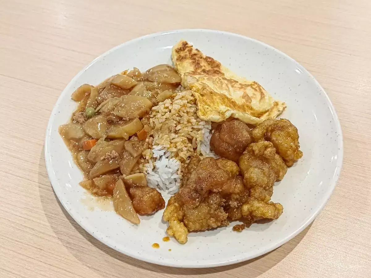 He Wei Mixed Vegetable Rice Porridge: Lemon Fried Fish, Potato, Onion Omelette with Rice & Curry