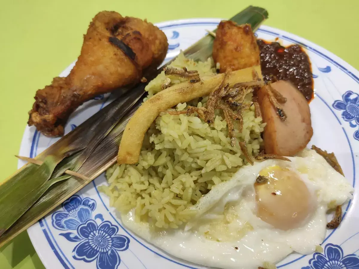 Pandan Leaf Nasi Lemak: Nasi Lemak with Chicken Drumstick, Otah, Luncheon Meat, Fish Cake, Ngo Hiang, Fried Egg & Ikan Bilis