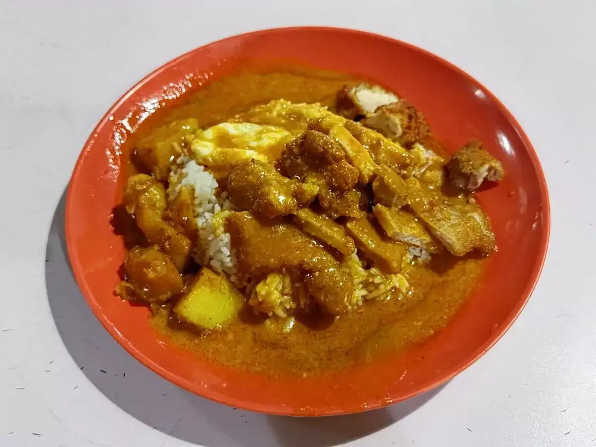 Singtaste Hainanese Scissors Curry Rice: Pork Chop, Chicken Cutlet, Potato, Fried Egg with Rice & Curry