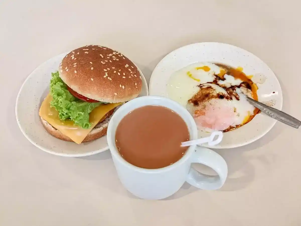 Uncle Mak Cafe: Black Pepper Chicken Cheese Burger, Half Boiled Egg & Teh